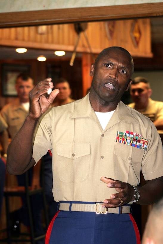 Sergeant Major John L. Estrada, 15th Sergeant Major of the Marine Corps, talks to the Marines of 1st Marine Corps District and 2nd Battalion 25th Marine at Tun Tavern, the all-ranks club located at the 1st Marine Corps District Headquarters in Garden City, N.Y., July 14.