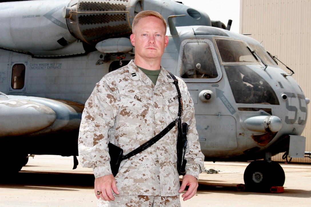AL ASAD, Iraq ? Captain Tony Dill, aircraft maintenance officer assigned to Marine Aviation Logistics Squadron 26, was selected as the recipient of the 2005 Marine Corps Aviation Association?s Earl Hattaway Marine Aviation Ground Officer of the Year Award.  Dill, a 1984 graduate of Liberty High School in his native Bedford, Va., enlisted in the Marine Corps that year and moved up the ranks to where he is today.