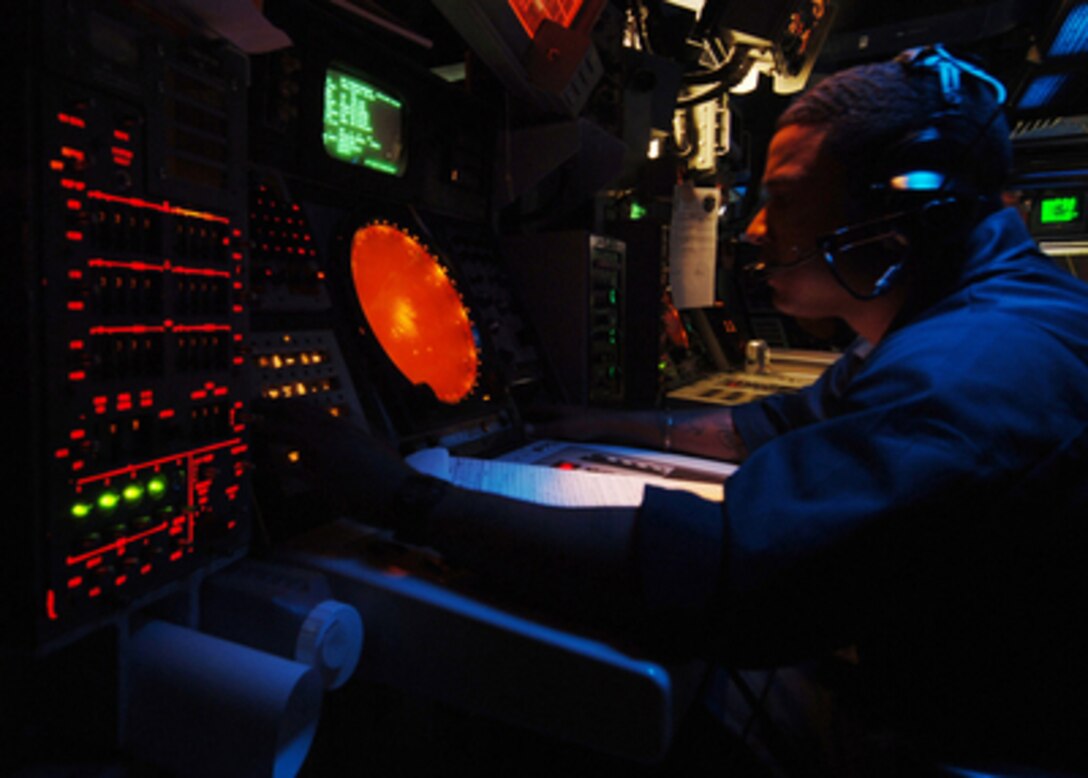 Petty Officer 2nd Class Rodney Cook tracks surface radar contacts in the Combat Information Center of the USS Thomas S. Gates (CG 51) while underway in the Pacific Ocean on July 15, 2005. The guided missile cruiser, along with naval and coast guard units from Colombia, Chile, Ecuador, Peru and Panama, are participating in UNITAS 46-05. U.S. Naval Forces Southern Command sponsors the exercise with the objective of increasing interoperability and to foster cooperation among naval forces in the region. During the two-week exercise, participating forces will have the opportunity to practice and test their skills in areas such as anti-submarine warfare, air defense, maritime interdiction operations and surface gunnery. Cook is a Navy operations specialist. 