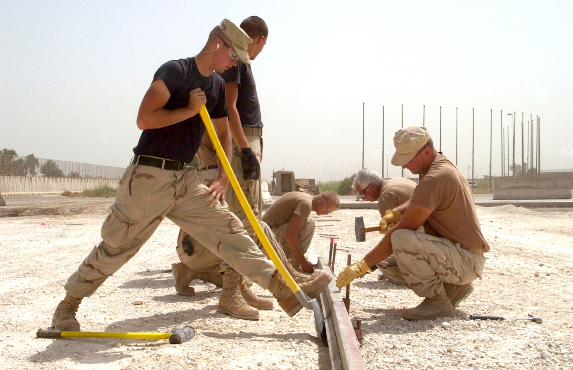 BAGHDAD, Iraq -- Red Horse engineers prepare concrete forms at the main entry control point for the Baghdad International Airport complex.  The project will be used to improve security for civilians and coalition forces in the area.  (U.S. Air Force photo by Tech. Sgt. Brian Davidson)