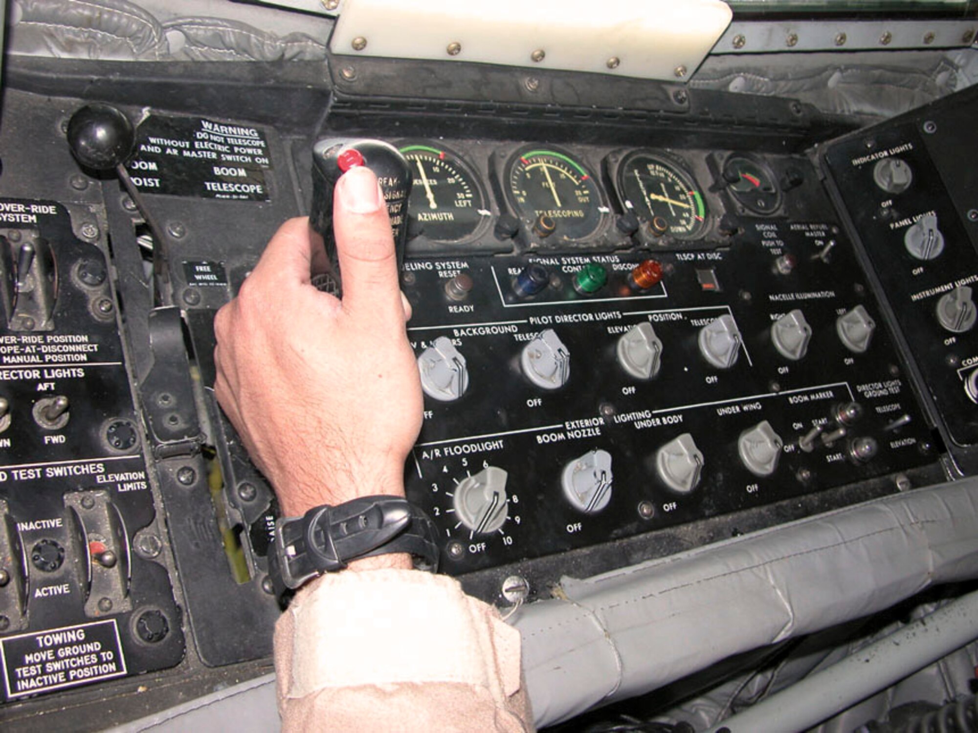 SOUTHWEST ASIA -- Staff Sgt. Jonny Gomez works the control panel of a KC-135 Stratotanker as he unloads fuel into a B-52 Stratofortress.  He is a boom operator with the 340th Expeditionary Air Refueling Squadron at a forward-deployed location.  (U.S. Air Force photo by Tech. Sgt. Mark Munsey)