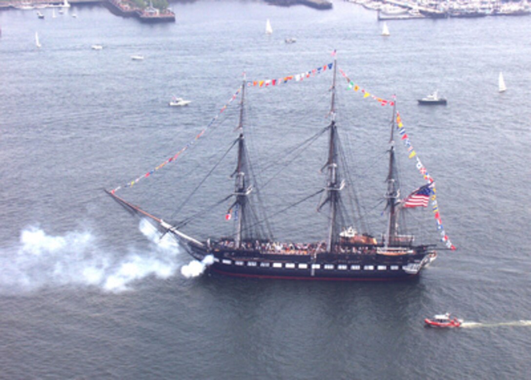 The USS Constitution fires a 19-gun salute to the city of Boston, Mass., during a turnaround cruise on July 16, 2005. Constitution, the world's oldest commissioned warship afloat, is turned periodically to even out the effects of weathering on its wooden hull. 