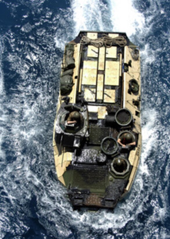 A Marine Amphibious Assault Vehicle maneuvers while preparing to enter the well deck aboard the amphibious assault ship USS Kearsarge (LHD 3) in the Persian Gulf on July 23, 2005. Kearsarge and her embarked 26th Marine Expeditionary Unit are on a scheduled deployment conducting Maritime Security Operations in the Persian Gulf. 