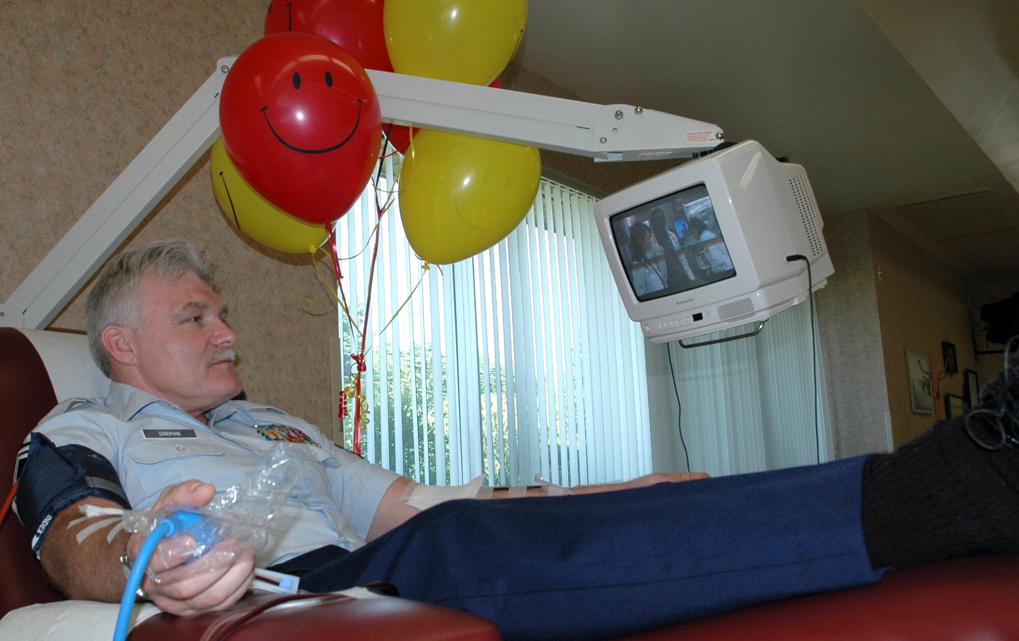 DOVER, Del. -- Senior Master Sgt. Carl Donophan donates platelets for the 100th time July 22, a rare achievement which took him 13 years to accomplish.  Since the Blood Bank of Delmarva opened in the 1970s, only 27 people in Delaware have reached this milestone.  He is a reservist with the 512th Equipment Maintenance Squadron at Dover Air Force Base.  (U.S. Air Force photo by 1st Lt. Marnee A.C. Losurdo)