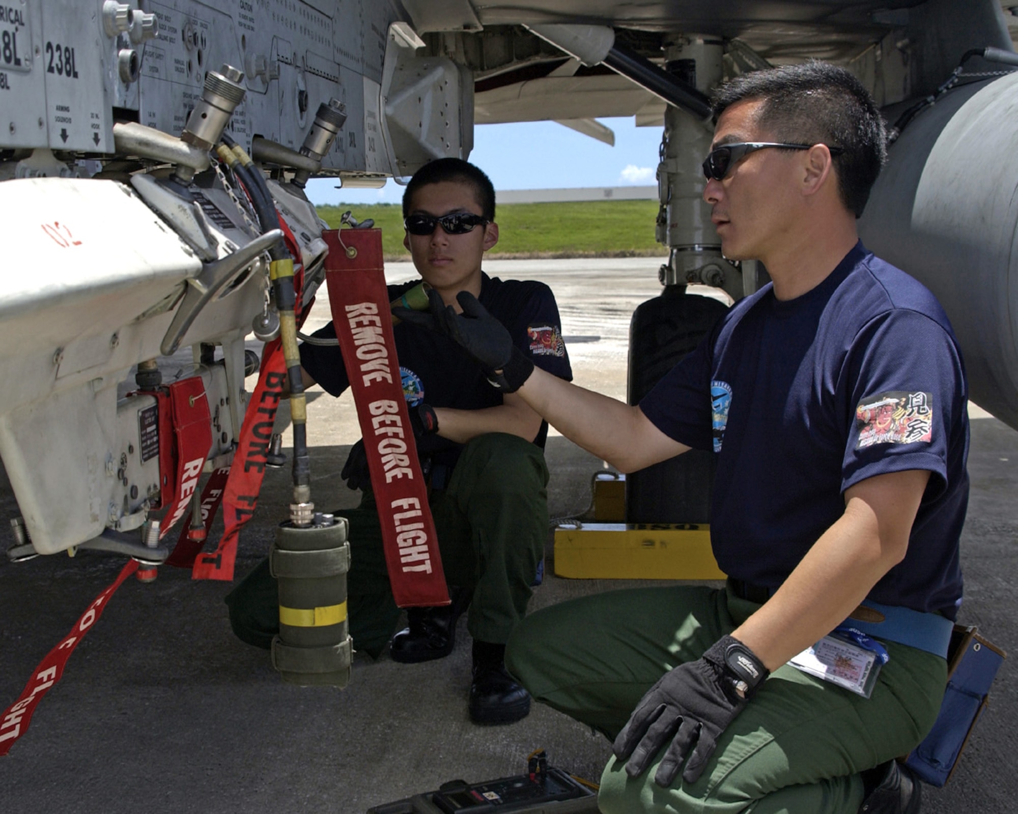 ANDERSEN AIR FORCE BASE, Guam -- Japanese air self-defense force maintainers prepare an F-4EJ Kais for a mission during Cope North here. The bilateral exercise included about 300 U.S. Airmen and about 250 Japanese participants.  (U.S. Air Force photo by Airman Michael Dorus)
