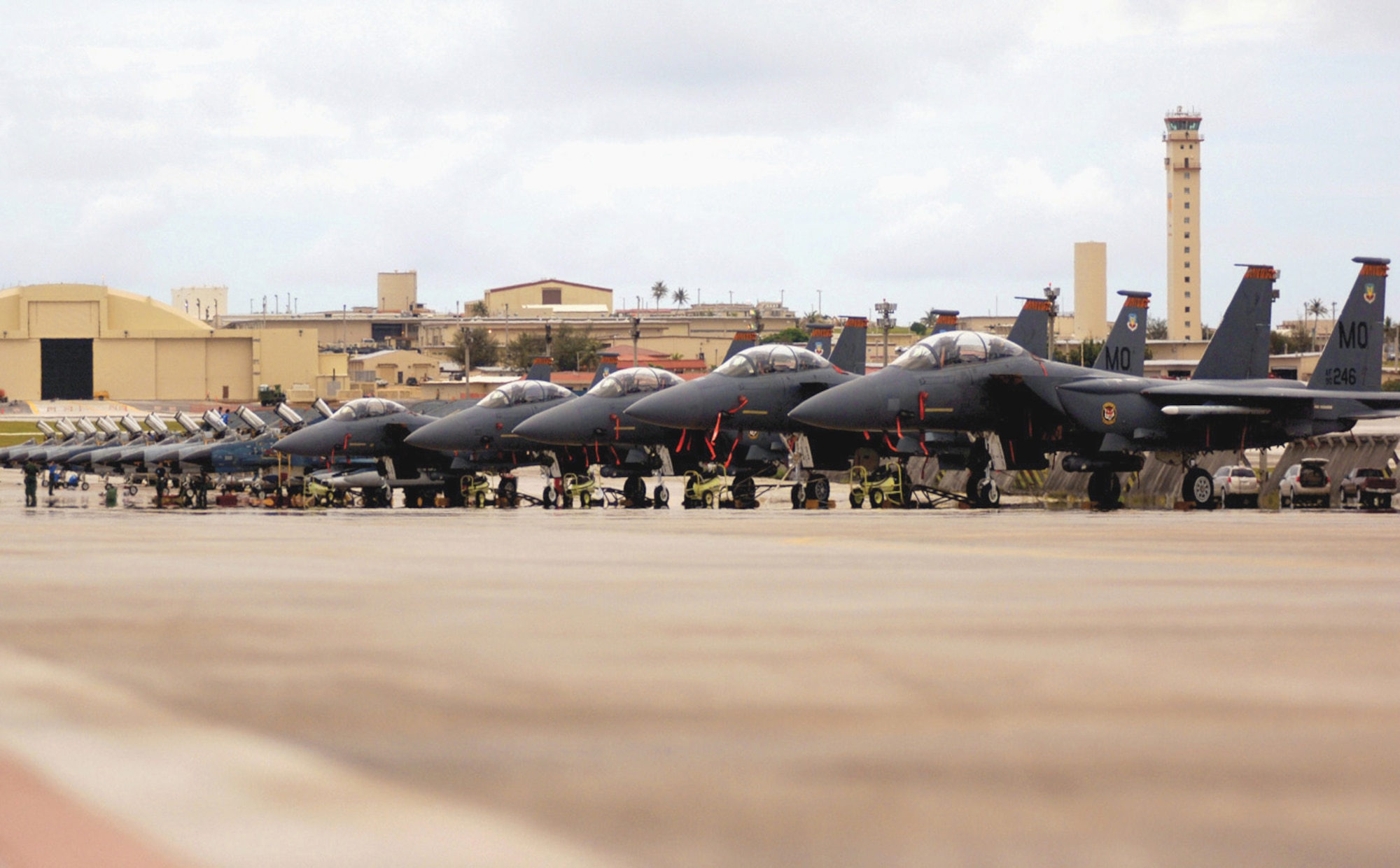 ANDERSEN AIR FORCE BASE, Guam -- U.S. Air Force F-15E Strike Eagles and Japanese F-4EJ Kais sit on the parking ramp, ready for an exercise mission during Cope North, which ended July 21.  (U.S. Air Force photo by Staff Sgt. Bennie J. Davis III)