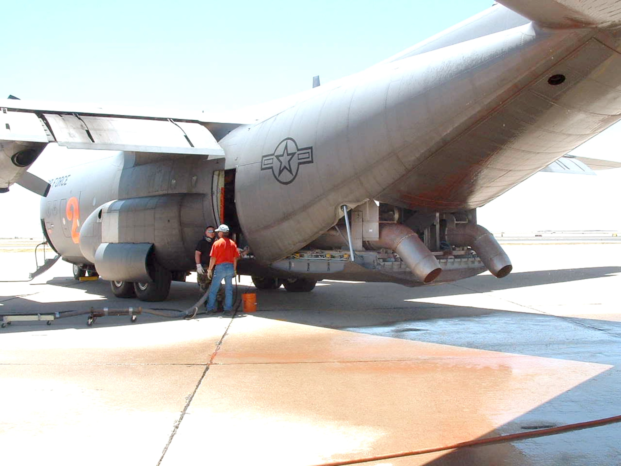KIRTLAND AIR FORCE BASE, N.M. -- A C-130 Hercules is equipped with the modular airborne fire fighting system used to disperse chemical fire retardants over wildfires.  The equipment is owned by the U.S. Forest Service, but Air National Guard and Reserve units maintain and install the equipment when needed to fight fires.  (Photo by Ken Frederick)