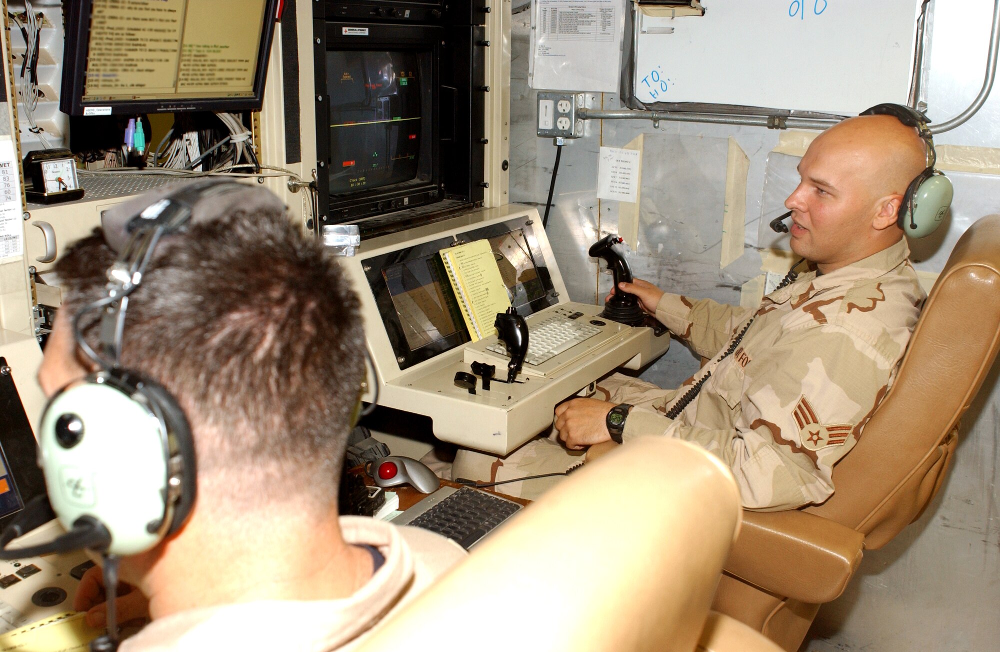 BALAD AIR BASE, Iraq -- Senior Airman Justin  Warnack goes over preflight checks before a mission supporting Operation Iraqi Freedom. (U.S. Air Force photo by Senior Airman Shaun Emery)                               