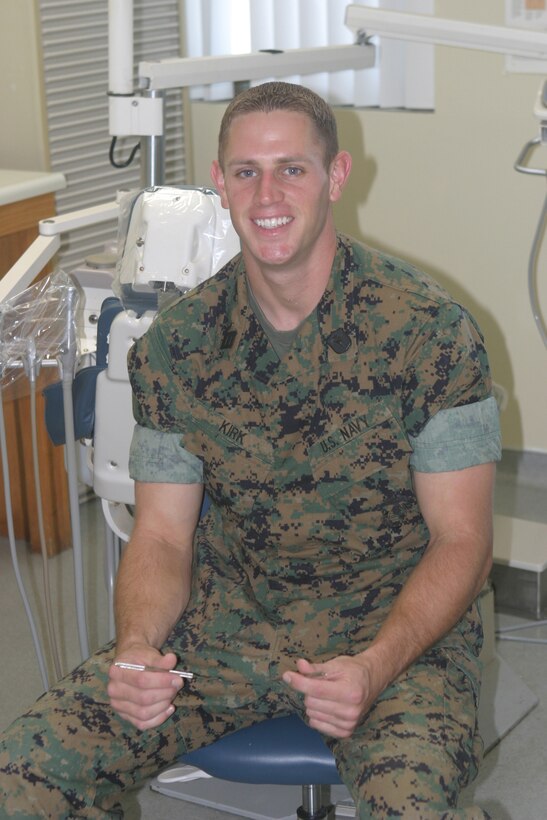 Seaman Joseph P. Kirk, dental technician, 21st Dental Company, 3rd Dental Battalion, Okinawa, Japan, is surrounded by the tools of his trade at Marine Corps Base Hawaii, Kaneohe Bay, Dental Clinic. Kirk said the job he chose in the Navy will provide good opportunities for him once his Navy career is over.