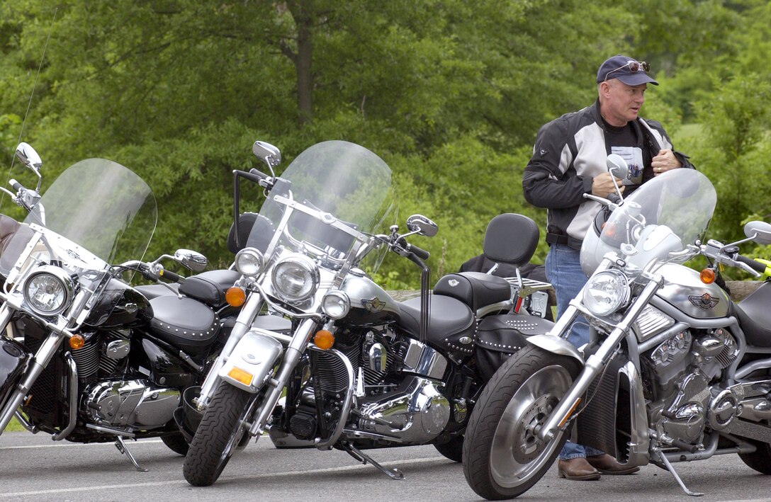 ANDREWS AIR FORCE BASE, Md. -- Lt. Gen. Richard V. Reynolds suits up after attending a motorcycle safety forum here May 28.  About 60 riders attended the forum including 12 from Wright Patterson Air Force Base, Ohio.  General Reynolds is the Air Force Materiel Command vice commander at Wright-Patterson.  (U.S. Air Force photo by Tech. Sgt. Tracy L. DeMarco)