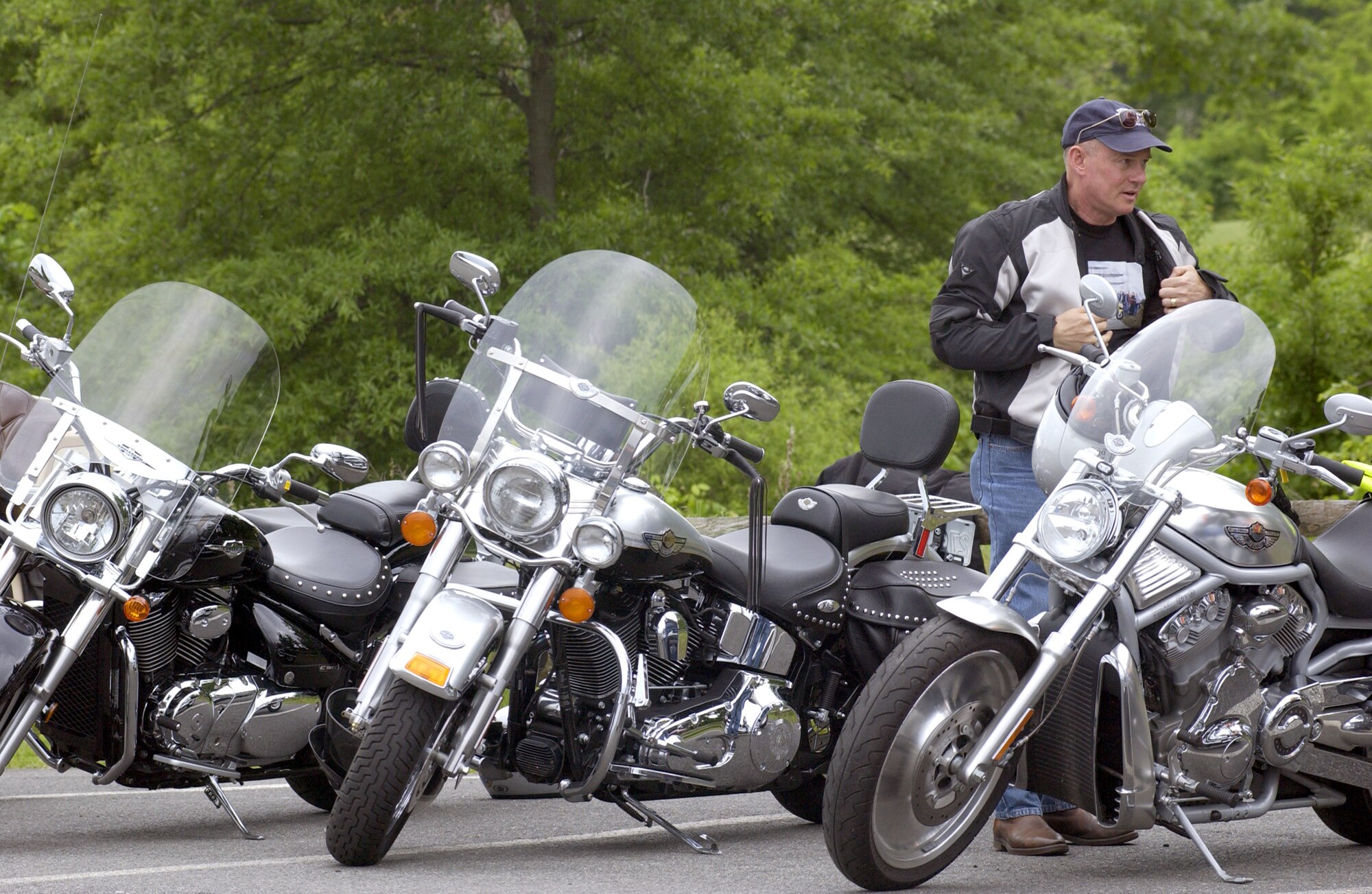 ANDREWS AIR FORCE BASE, Md. -- Lt. Gen. Richard V. Reynolds suits up after attending a motorcycle safety forum here May 28.  About 60 riders attended the forum including 12 from Wright Patterson Air Force Base, Ohio.  General Reynolds is the Air Force Materiel Command vice commander at Wright-Patterson.  (U.S. Air Force photo by Tech. Sgt. Tracy L. DeMarco)