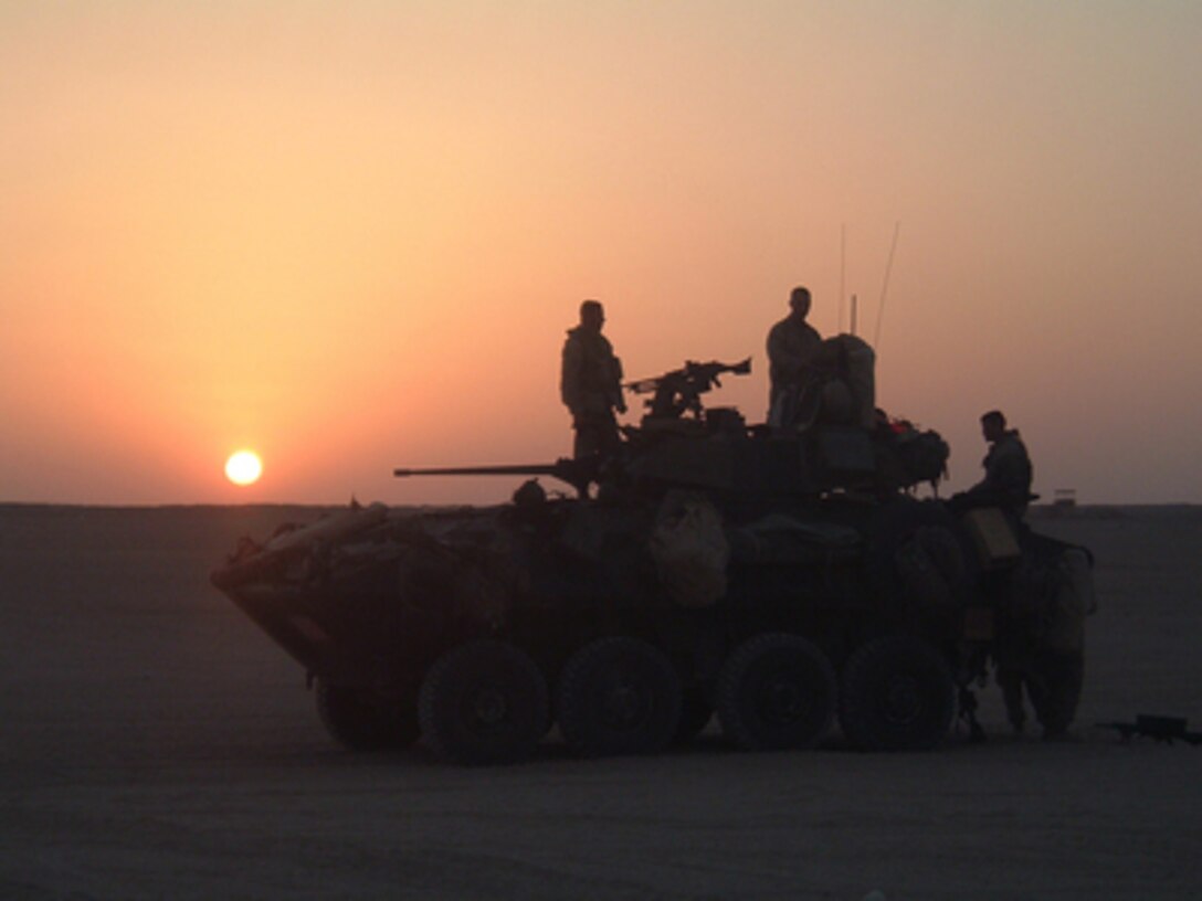 U.S. Marines prepare their Light Armored Vehicle for a night movement to Udairi Range near Camp Buehring, Kuwait, on May 26, 2005. The Marines are with the 8th Marine Regiment, 26th Marine Expeditionary Unit (Special Operations Capable) and will be conducting live fire exercises at Udairi Range in preparation for missions in the region. 