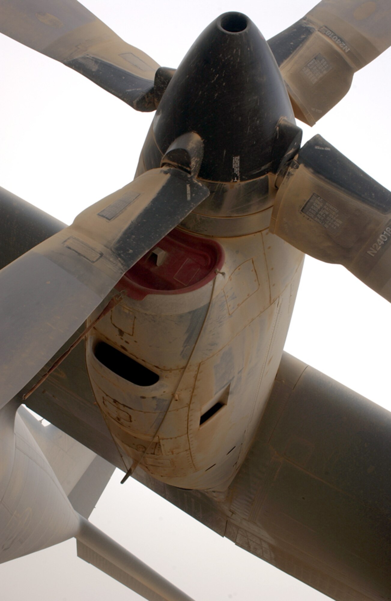 BAGHDAD, Iraq -- A C-130 Hercules sits grounded because of poor visibility from an overnight sandstorm that brought 40 mph winds and a blanket of dust here recently.  The C-130 is assigned to the 910th Airlift Wing in Youngstown, Ohio.  (U.S. Air Force photo by Tech. Sgt. Brian Davidson)          
