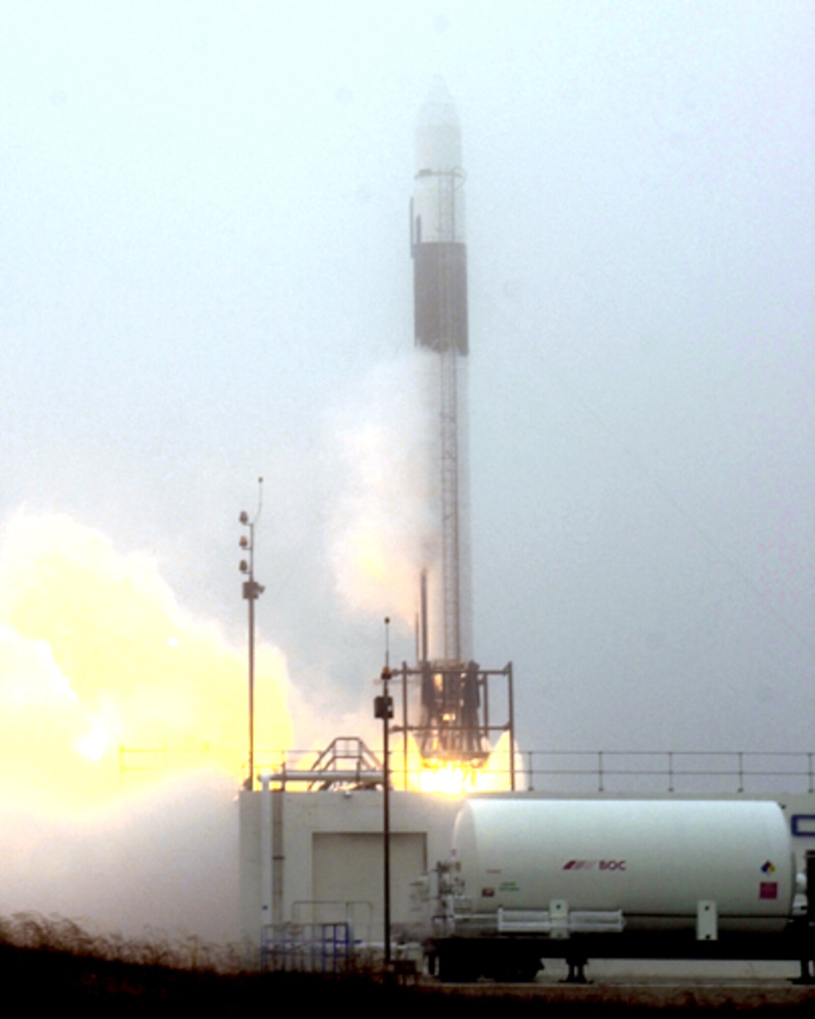 VANDENBERG AIR FORCE BASE, Calif. -- The main engine of the Falcon I rocket ignites during a full-wet dress rehearsal here recently.  (U.S. Air Force photo by Mark Mackley)