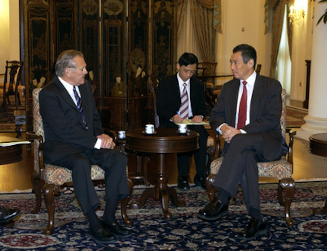 Secretary of Defense Donald H. Rumsfeld (left) meets with Singapore Prime Minister Lee Hsien Loong at the Istana in Singapore on June 4, 2005. Rumsfeld is in Singapore to attend the 4th International Institute for Strategic Studies Asia Security Conference: The Shangri-La Dialogue in Singapore. The Asia Security Conference brings ministers of defense and other senior officials of Pacific nations together to discuss such topics as terrorism, piracy and defense capabilities in the region. 