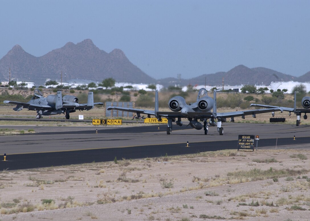 DAVIS-MONTHAN AIR FORCE BASE, Ariz. -- A-10 Thunderbolt IIs assigned to the 357th Fighter Squadron here prepare to deploy during a local exercise.  The exercise demonstrated the wing's ability to deploy people, equipment and aircraft to support contingency operations.  (U.S. Air Force photo by Airman 1st Class Jesse Shipps)