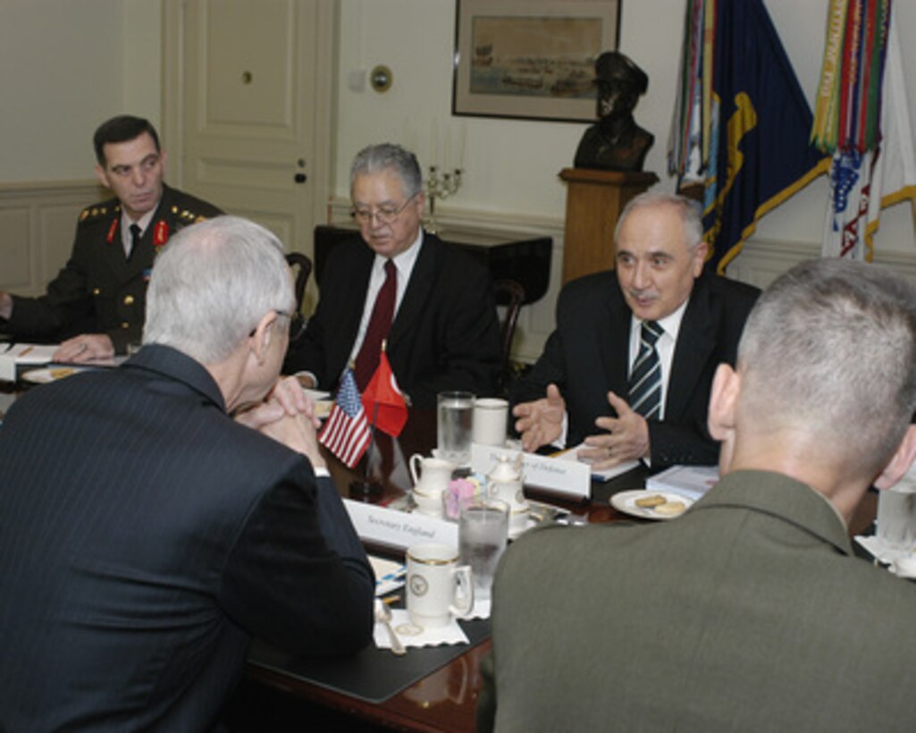 Turkey's Minister of National Defense Vecdi Gonul (right) meets with Acting Deputy Secretary of Defense Gordon England in the Pentagon on June 6, 2005. Gonul and England are meeting to discuss defense issues of mutual interest. From left to right: Director of Strategy and Force Planning for the General Staff Maj. Gen. Cengiz Arslan, Turkey's Ambassador to the U.S. Faruk Logoglu, Gonul, England (foreground left) and Vice Chairman of the Joint Chiefs of Staff Gen. Peter Pace (foreground right). 