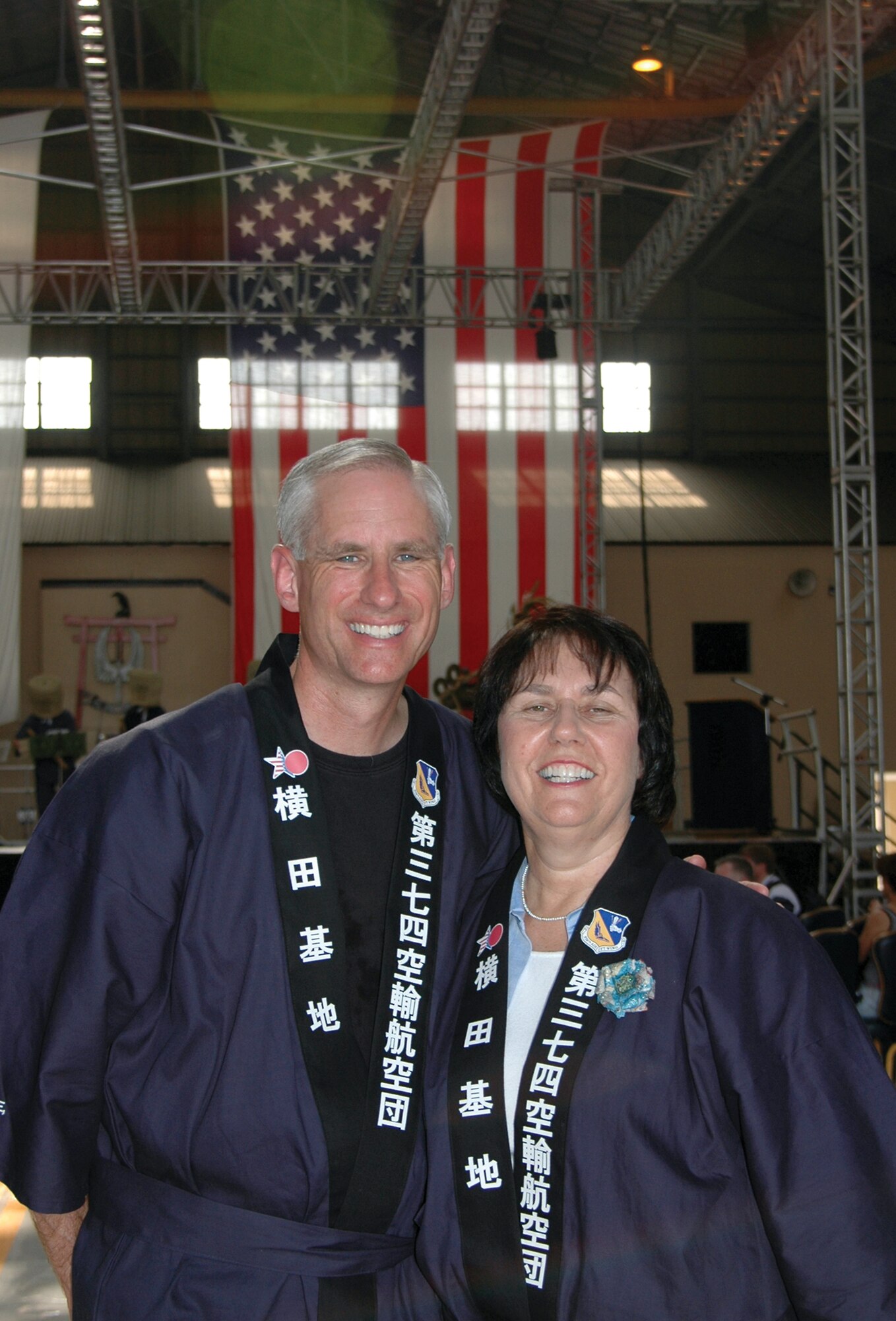YOKOTA AIR BASE, Japan -- Col. Mark Schissler and his wife, Marcia, ware the recipients of the 2004 General and Mrs. Jerome F. O'Malley Award.  Colonel Schissler is the former 374th Airlift Wing commander here.  (U.S. Air Force photo by Dr. S. P. Holowenzak)
