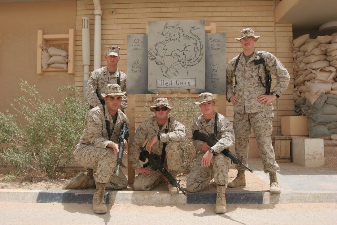 AL ASAD, Iraq - (From L-R) Corporal Keith Challet, embark chief; Lance Cpl. Timothy Brake, embark clerk; Cpl. Thomas Tupps, supply chief; Cpl. Ryan Walters, embark noncommissioned officer and Sgt. Troy Cook, armorer, make up the logistics shop with Marine All-Weather Fighter Attack Squadron 224.  These five Marines worked to move the Bengals? more than 200 Marines and sailors along with 200,000 pounds of gear here and will soon be begin planning the units return to their home base, Marine Corps Air Station, Beaufort, S.C.