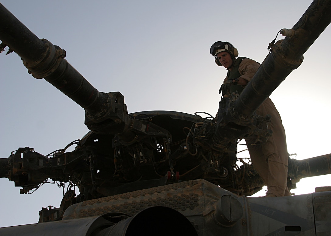 AL ASAD, Iraq (June 14, 2005) ? Capt. Shane R Rosenthal, CH-53E Super Stallion pilot and native of Loveland, Co., has a look around the aircraft prior to take off. Rosenthal, and the aircrews of HMH-465 have flown close to 2,000 hours during their third deployment to support of Operation Iraqi Freedom.