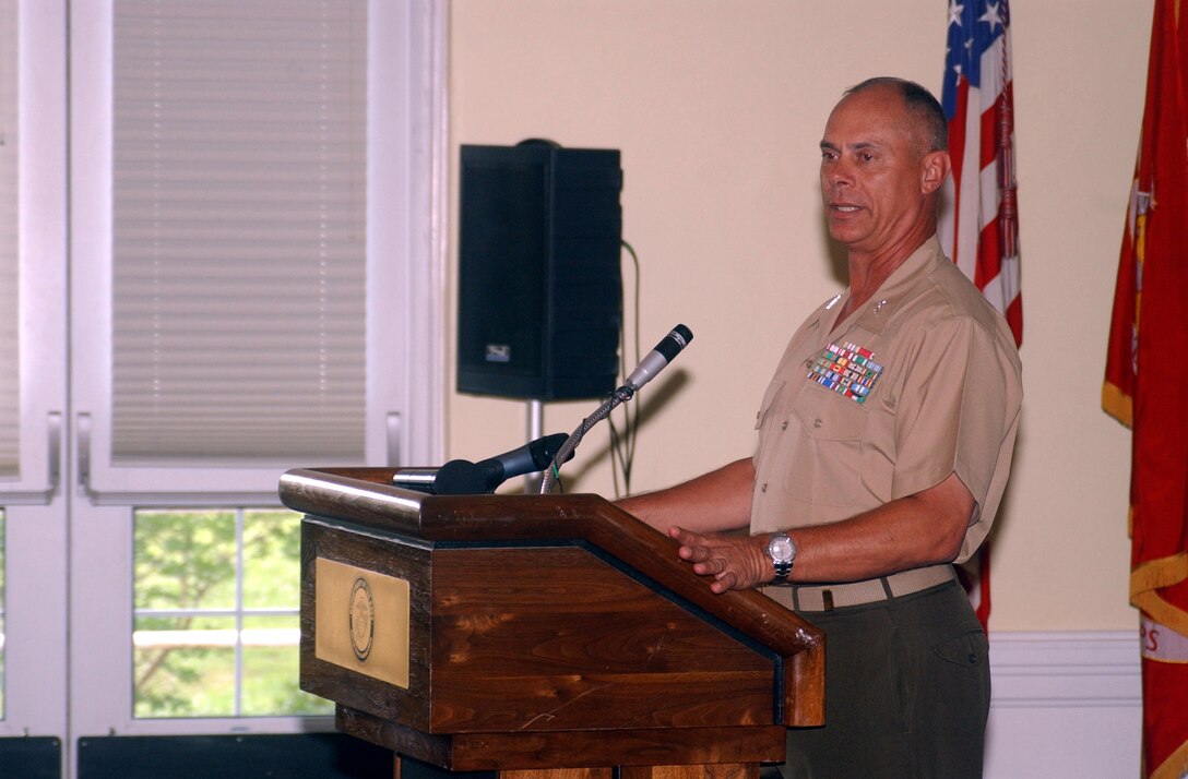 MARINE CORPS BASE CAMP LEJEUNE, N.C. - Major Gen. Robert C. Dickerson, commanding general, Marine Corps Base, speaks at his award ceremony after receiving his Long Leaf Pine award for his history of service to the community at the Paradise Point Officer's Club June 13.   The Long Leaf Pine award is presented to an individual for dedication and extended length to an organization as the State of North Carolina's highest honor. Purdue presented the award on behalf of Gov. Mike Easley.  (Official Marine Corps photo by Pfc. Drew Barker)