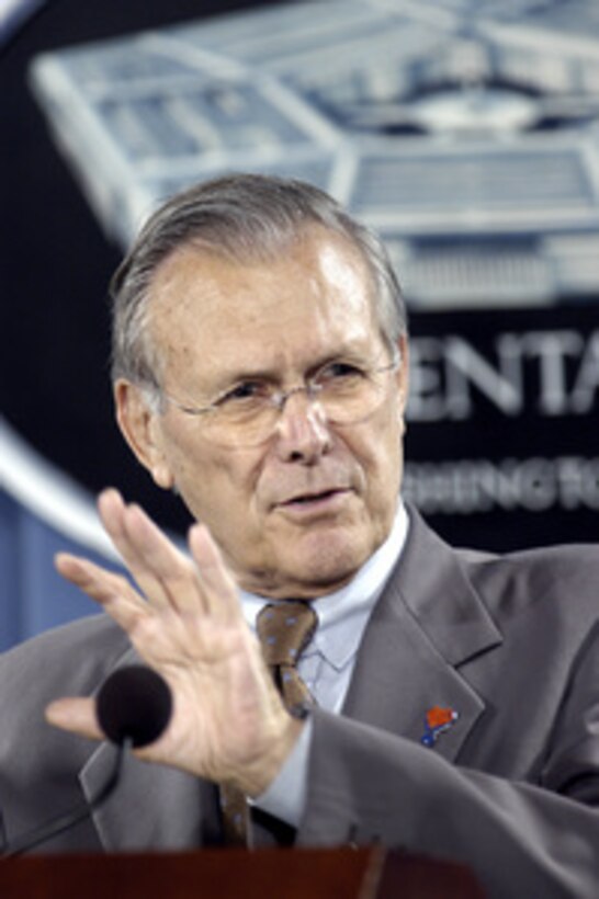 Secretary of Defense Donald H. Rumsfeld explains to members of the news media how deeply he feels is the importance of the democratization of Iraq during a Pentagon press briefing on June 14, 2005. 