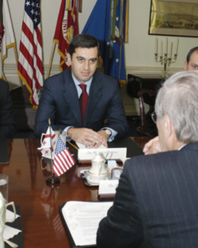 Georgian Minister of Defense Irakli Okruashvili meets with Secretary of Defense Donald H. Rumsfeld in the Pentagon on June 17, 2005. Okruashvili and Rumsfeld are meeting to discuss defense issues of mutual interest. 