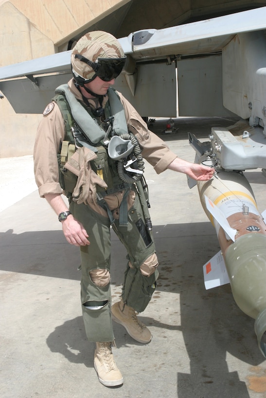 AL ASAD, Iraq-A pilot with Marine All-Weather Fighter Attack Squadron 224 conducts final checks before launching in support of Operation Spear June 20.  The squadron flew 24 sorties in direct combat support as Marines and soldiers battled insurgents near the Syrian border.