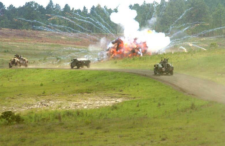 FORT POLK, La. -- A roadside bomb detonates near a convoy during Air Warrior II here.  During this live-fire portion of the exercise, the Army convoy is attacked by a simulated enemy and must respond.  A-10 Thunderbolt II aircraft helped suppress the simulated attack with guidance from Air Force joint terminal attack controllers embedded with the 10th Mountain Division.  (U.S. Air Force photo by Senior Airman Stephen Otero)