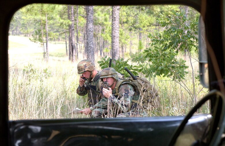 FORT POLK, La. -- Senior Airman Joshua Cullins (right) and Staff Sgt. Dan Kovarik guide an A-10 Thunderbolt II onto a target during a live-fire portion of Air Warrior II here.  The joint exercise trains Army units with embedded Air Force Joint terminal attack controllers in a realistic battlespace.  Troops face a live enemy force, local role players and a variety of targets for air and ground forces.  (U.S. Air Force photo by Senior Airman Stephen Otero)