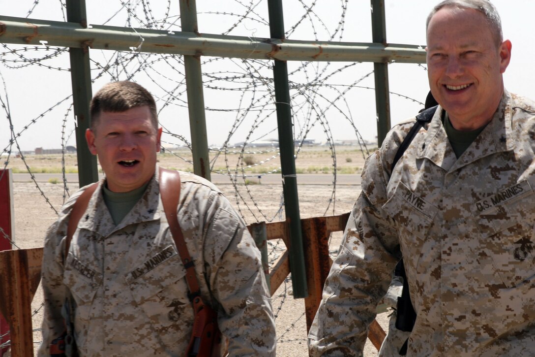 AL TAQADDUM, Iraq (April 25, 2007) -- Brig. Gen. Payne, the director of the Central Command Deployment Distributions Operations Center, arrived here April 25 to be greeted by Brig. Gen. Kessler, the commanding general of 2nd Marine Logistics Group (Forward). Payne met with many leaders here to exchange ideas to improve upon supply tansportation operations.