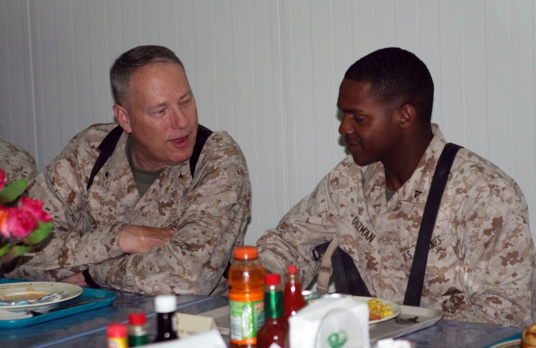 Brig. Gen. Payne has a meal at the dining facility here with the active reservists of 4th Marine Logistics Goup. Payne once served as the unit's commanding general.