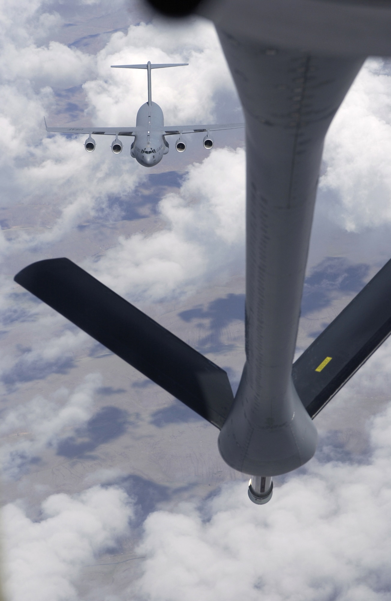 MCCHORD AIR FORCE BASE, Wash. -- A C-17 Globemaster III from Altus Air Force Base, Okla., prepares to receive fuel from a KC-135 Stratotanker assigned to the 22nd Air Refueling Wing at McConnell AFB, Kan., during the June 20 aerial refueling competition at Rodeo 2005. (U.S. Air Force photo by Tech. Sgt. Jerry Morrison)