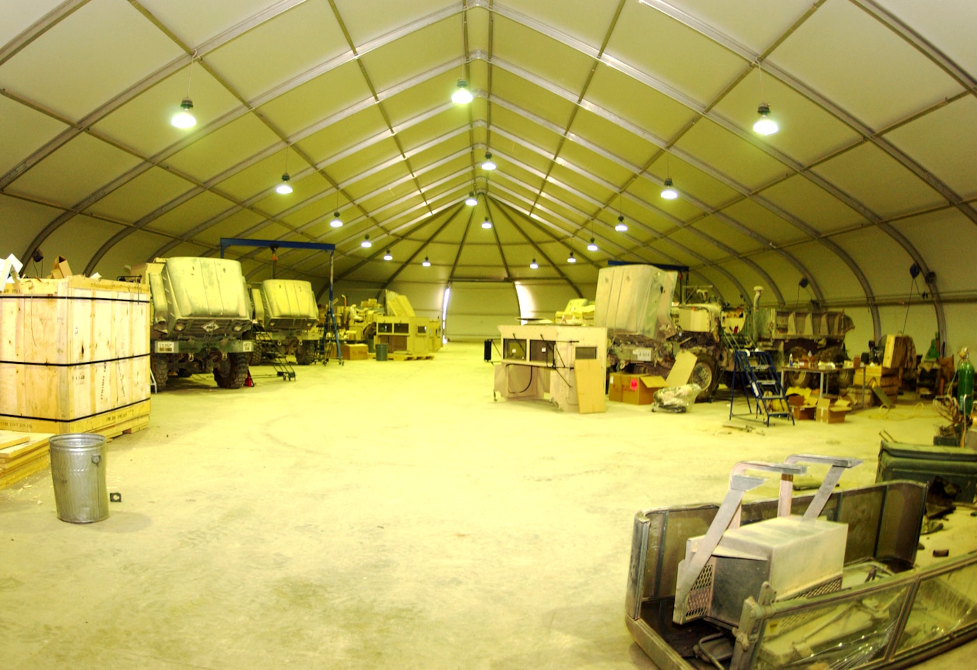 BALAD AIR BASE, Iraq -- The 732nd Expeditionary Mission Support Group's add-on armor shop Airmen can add armor to a large truck in about 72 man-hours.  The shop comprises active-duty, Guard and Reserve Airmen.  (U.S. Air Force photo by Senior Airman Tim Beckham)
