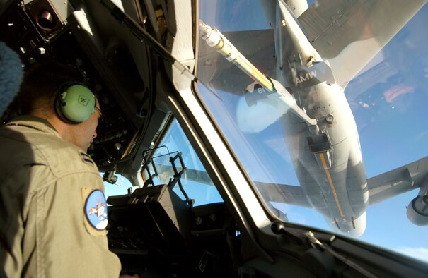 Capt. Douglas Snead flies a C-17 Globemaster III toward a KC-10 Extender for aerial refueling June 17, 2013, before an airdrop mission supporting Talisman Saber 2005. Snead is assigned to 8th Airlift Squadron at McChord Air Force Base, Wash. (U.S. Air Force photo/Tech. Sgt. Rick Sforza) 

