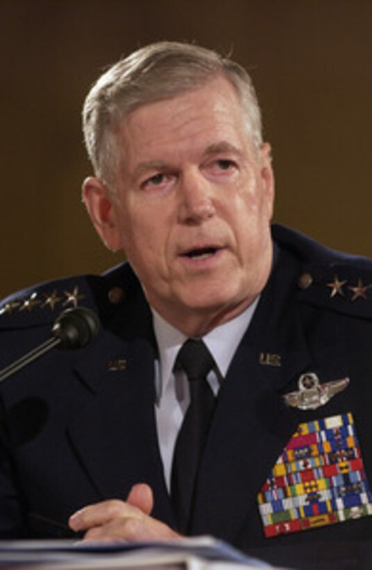 Chairman of the Joint Chiefs of Staff Gen. Richard Myers, U.S. Air Force, responds to a senator's question during a Senate Armed Services Committee hearing on the U.S. military strategy in Iraq on Capitol Hill in Washington, D.C., on June 23, 2005. Secretary of Defense Donald Rumsfeld, U.S. Central Command Commander Gen. John Abizaid, U.S. Army, and Commanding General of Multi-National Forces in Iraq Gen. George Casey Jr., U.S. Army, joined Myers in testifying before the committee. 