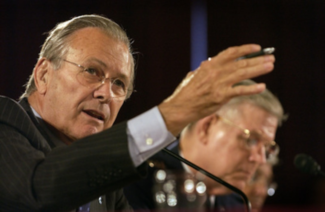 Secretary Rumsfeld Gestures To Make A Point As He Responds To A Senator ...