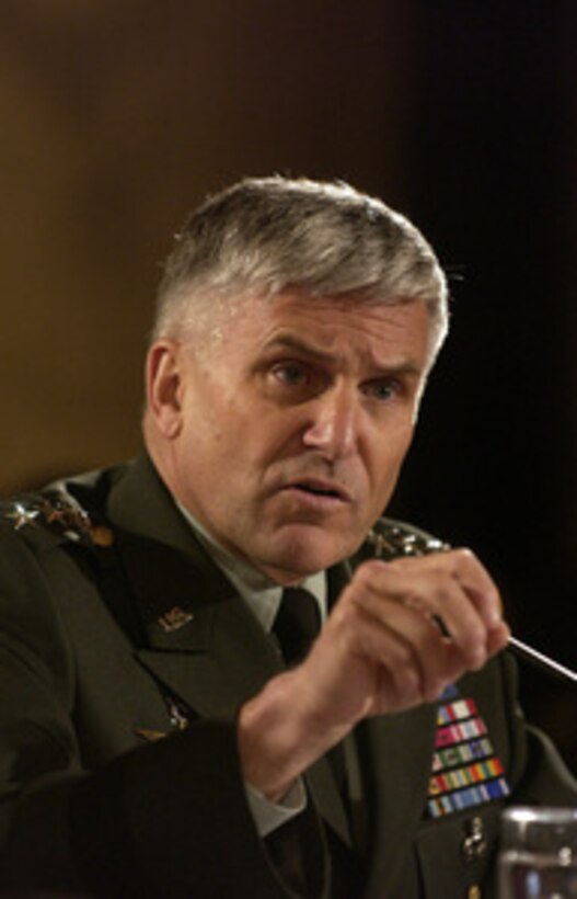 Commander of the Multinational Force Iraq Gen. George Casey Jr., U.S. Army, responds to a senator's question during a Senate Armed Services Committee hearing on the U.S. military strategy in Iraq on Capitol Hill in Washington, D.C., on June 23, 2005. Secretary of Defense Donald Rumsfeld, U.S. Central Command Commander Gen. John Abizaid, U.S. Army, joined Casey in testifying before the committee. 