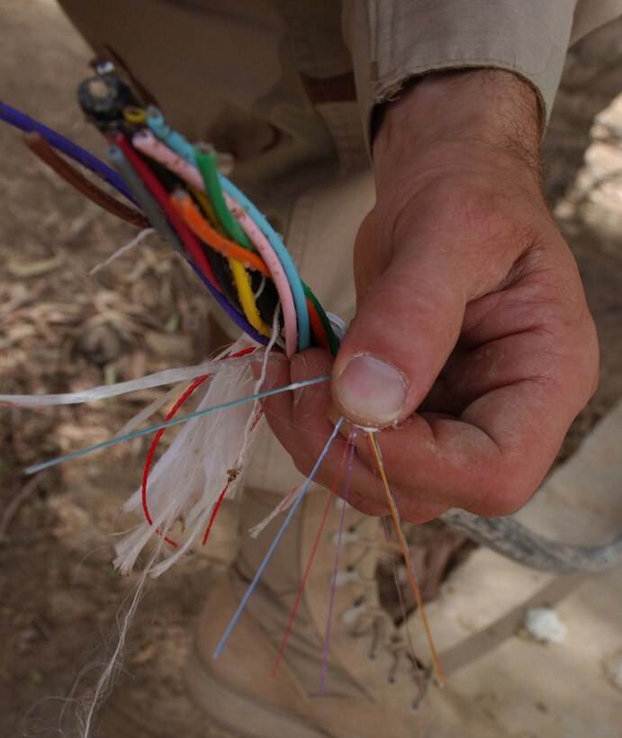 BAGHDAD, Iraq -- More than 22 miles of 144-strand fiber optic cable will be installed here to provide state-of-the-art communication among coalition compounds.  Each fiber optic strand is made of optically pure glass and is thinner than a human hair.  (U.S. Air Force photo by Tech. Sgt. Brian Davidson)                       