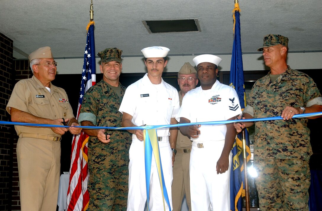 MARINE CORPS BASE CAMP LEJEUNE, N.C. - A ribbon cutting ceremony was held June 27 to signify the re-opening of Bachelor Enlisted Quarters 121 after extensive renovations.  Maj. Gen. Robert C. Dickerson Jr., the Commanding General for Marine Corps Base Camp Lejeune, was on hand for the ceremony, which was held at the entrance of the hospital barracks.