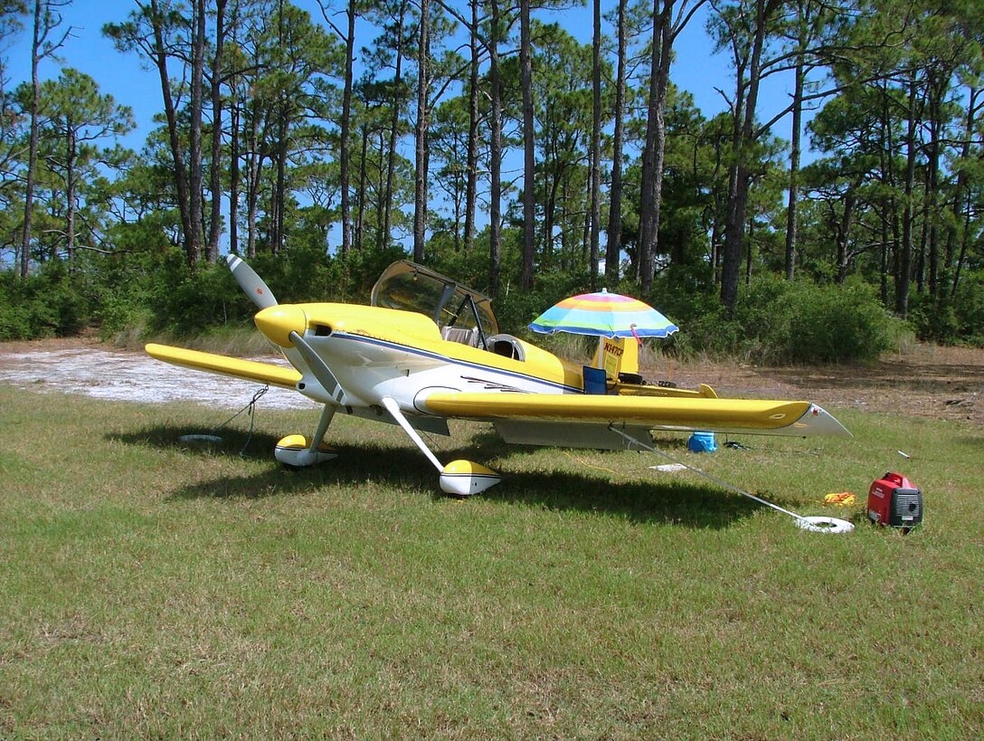 DOG ISLAND, Fla. -- Lt. Col. Edward Linch flew his private plane here during Field Day 2005.  The nationwide event is held by the American Radio Relay League to link amateur stations with federal, state and local disaster relief agencies.  Colonel Linch established a link to 36 other operators during extremely poor atmospheric conditions.  He is the wing plans chief of the 505th Command and Control Wing at nearby Hurlburt Field.  (U.S. Air Force photo)