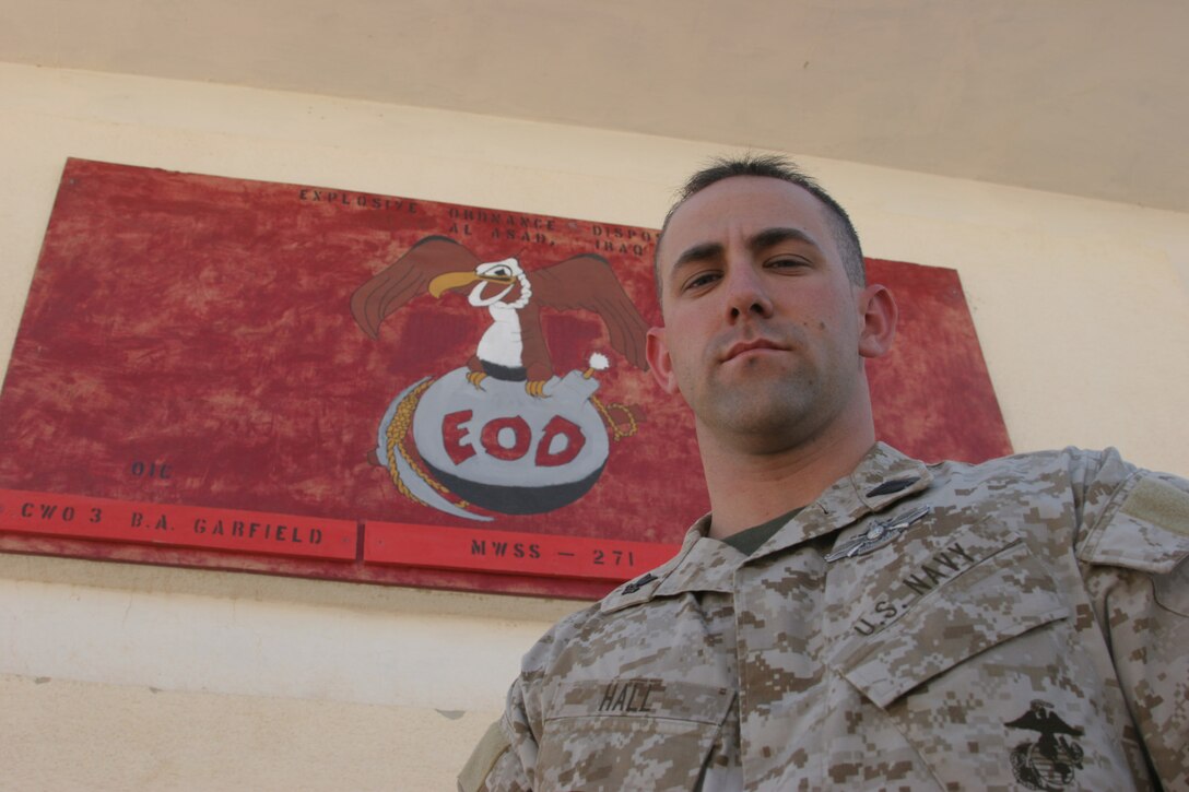 AL ASAD, Iraq - Petty Officer 2nd Class Jason Hall, a corpsman with the Marine Wing Support Squadron 271 explosive ordnance disposal team one of two corpsmen permantly attached to the disposal team. Hall is serving for his second deployment in support of Operation Iraqi Freedom. His first tour was with 2nd Tank Battalion in 2003.