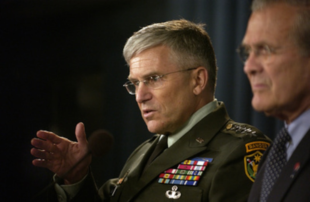 Commander, Multi-National Force-Iraq Gen. George W. Casey Jr., U.S. Army, gives an opening statement during a press conference with Secretary of Defense Donald H. Rumsfeld in the Pentagon on June 27, 2005. Rumsfeld and Casey fielded questions from reporters on the U.S. military strategy and operations in Iraq. 