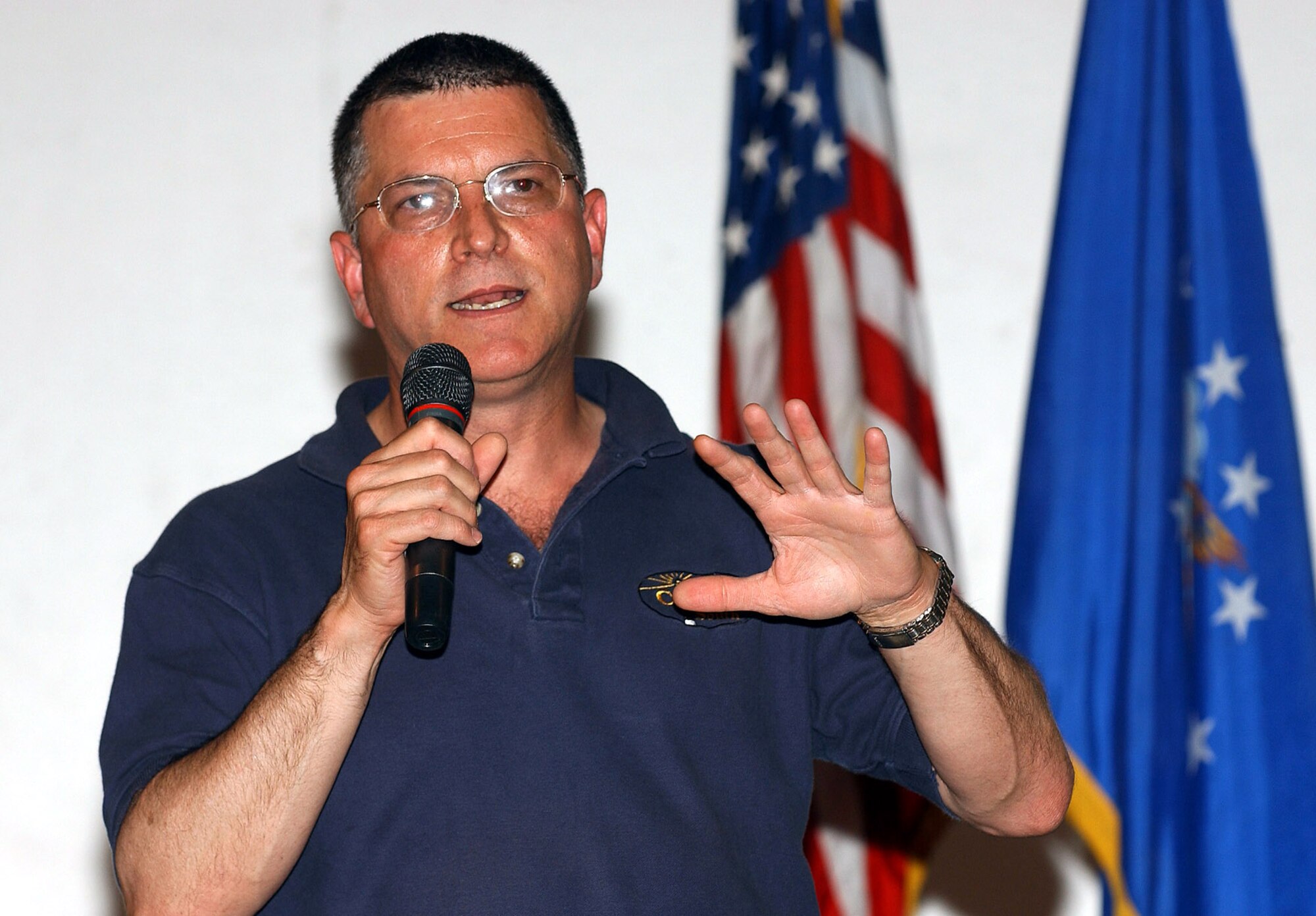 TALLIL AIR BASE, Iraq -- Michael L. Dominguez, acting secretary of the Air Force, speaks during a troop call here June 29.  He told Airmen the importance of the U.S. military's mission in Iraq and what the future image of an Air Force warfighter will look like for the next few years.  (U.S. Air Force photo by Master Sgt. Maurice Hessel)