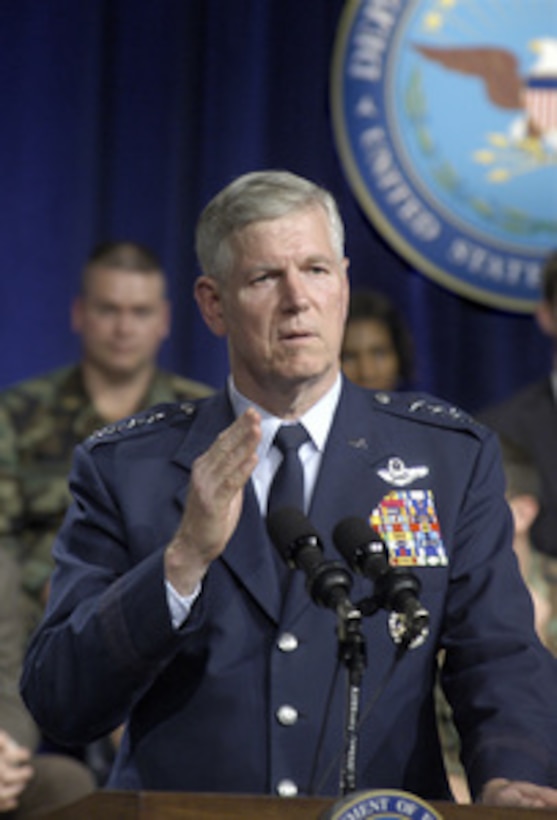 Chairman of the Joint Chiefs of Staff Gen. Richard B. Myers, U.S. Air Force, answers a question during a Pentagon Town Hall meeting on June 29, 2005. Myers joined Secretary of Defense Donald H. Rumsfeld in fielding a variety of questions from military and civilian Department of Defense employees. The meeting was televised live to service men and women worldwide on the Pentagon Channel. 