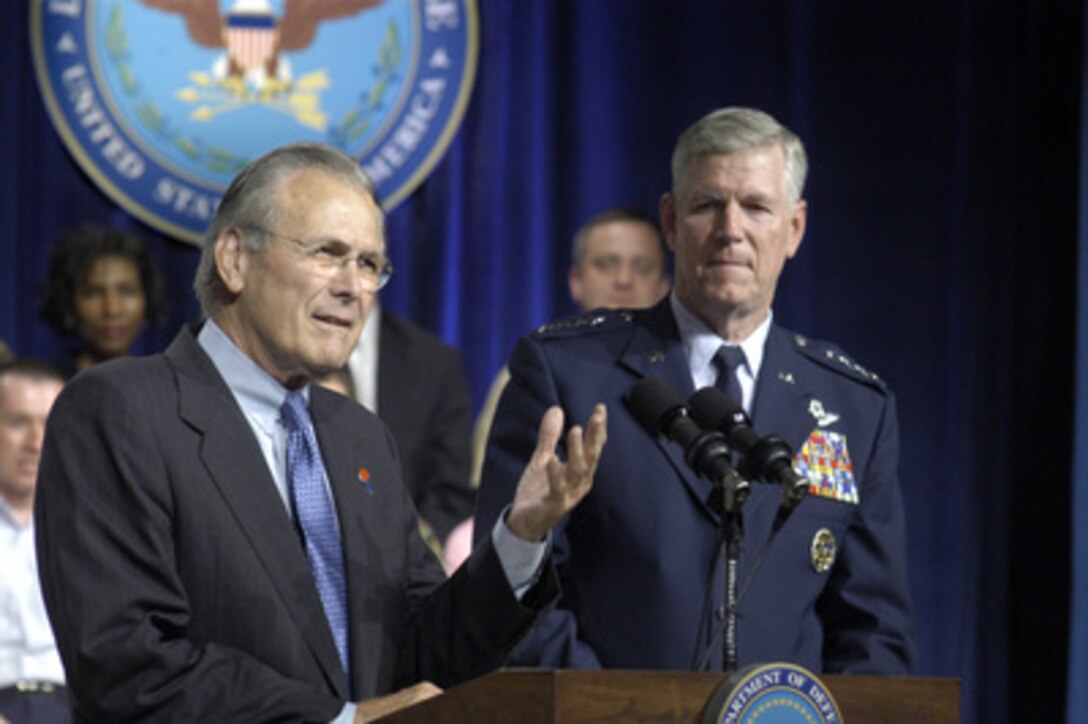 Secretary of Defense Donald H. Rumsfeld responds to a question from the audience during a Pentagon Town Hall meeting on June 29, 2005. Rumsfeld and Chairman of the Joint Chiefs of Staff Gen. Richard B. Myers, U.S. Air Force, fielded a variety of questions from military and civilian Department of Defense employees. The meeting was televised live to service men and women worldwide on the Pentagon Channel. 