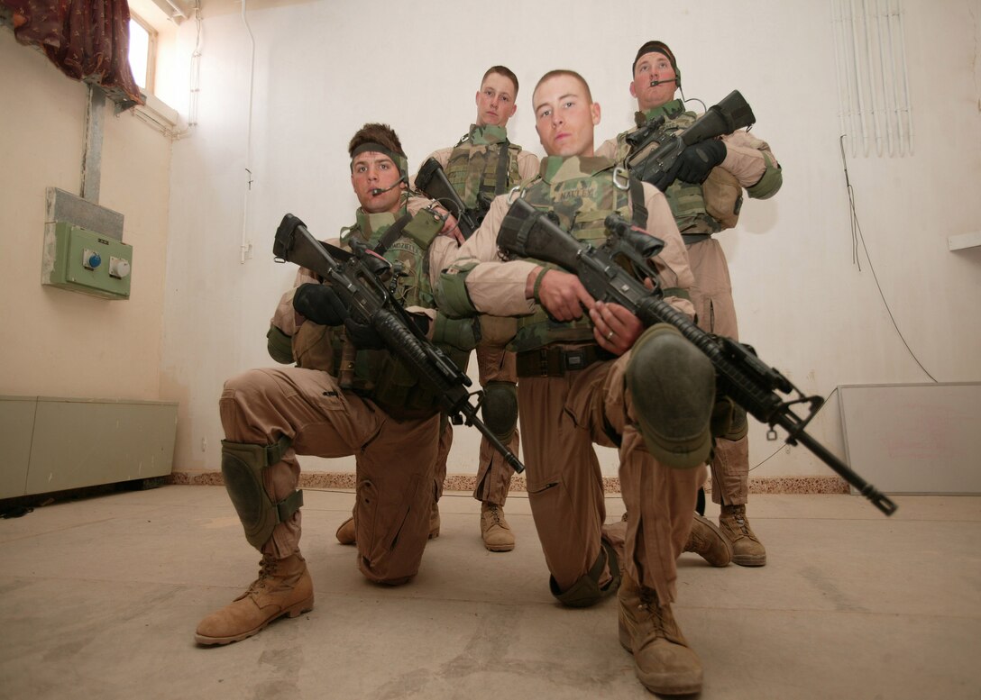(From left to right) Lance Cpls. Anthony Kondziella, Josh M. Nalley (bottom,) Christopher W. Smith and Justin R. Graff (top,) serving with Marine Wing Support Squadron 271's Immediate Reaction Team, stand ready every hour of the day to complete the IRT mission. The platoon of Marines has been conducting security escorts for the squadron's Explosive Ordnance Disposal team as they respond to calls on and around Al Asad air base, Iraq.
