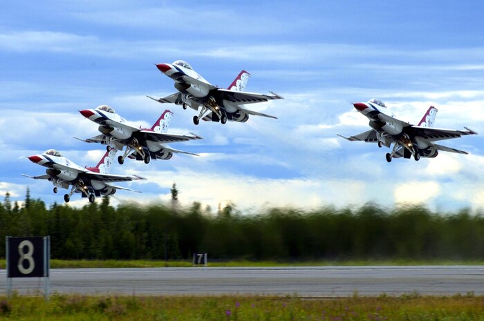 NELLIS AIR FORCE BASE, Nev. -- The Thunderbirds aerial demonstration team begins the day with a diamond takeoff.  (U.S. Air Force photo by Tech. Sgt. Sean M. White)