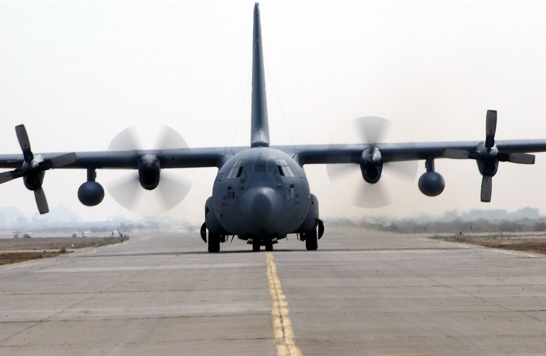 TALLIL AIR BASE, Iraq -- A C-130 Hercules taxis on the  flightline here after a mission Feb. 22. (U.S. Air Force photo by Master Sgt. Mark Bucher)