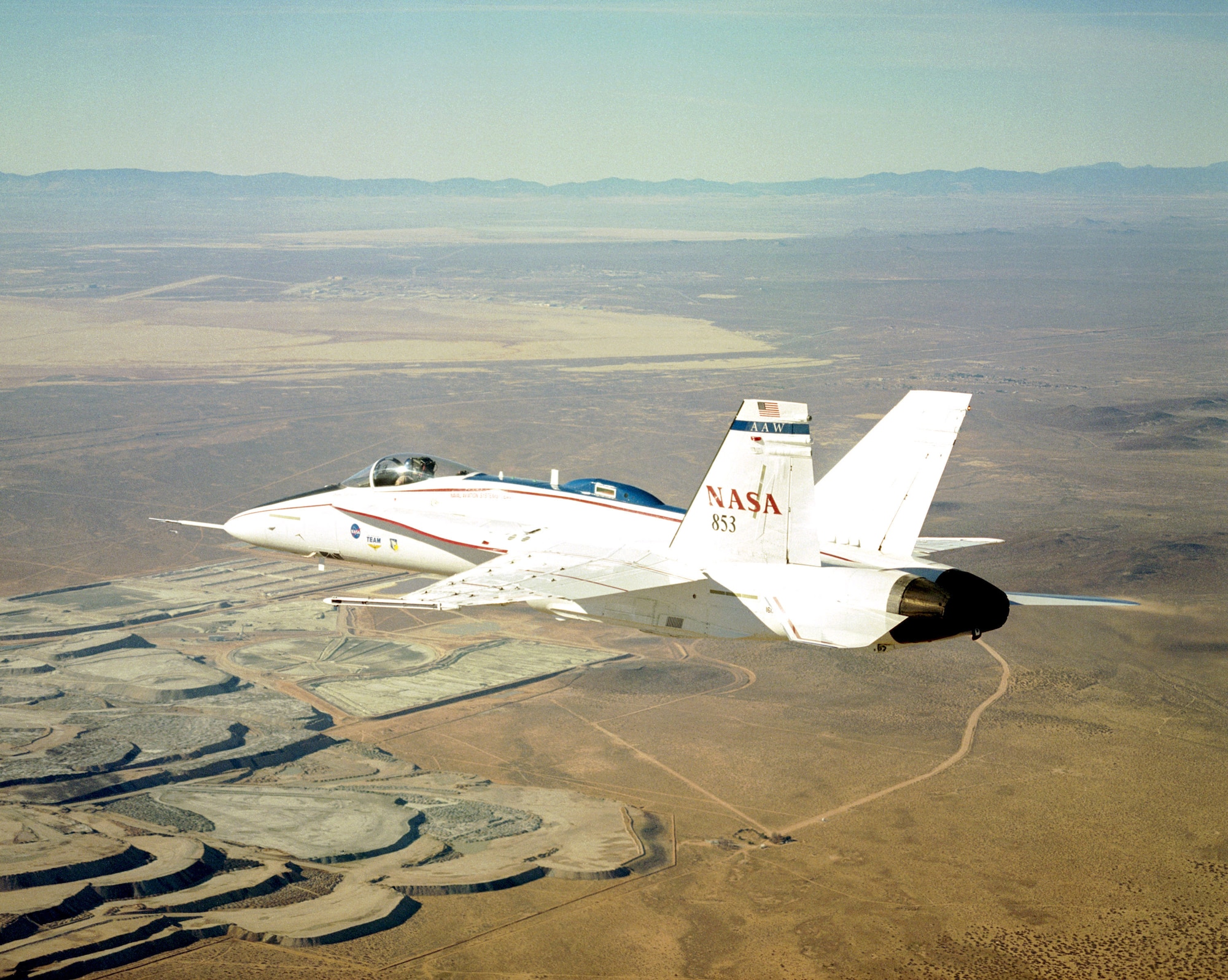 OVER EDWARDS AIR FORCE BASE, Calif. -- NASA's modified Active Aeroelastic Wing F/A-18 skims over the countryside during a recent research flight.  (NASA photo by Jim Ross)